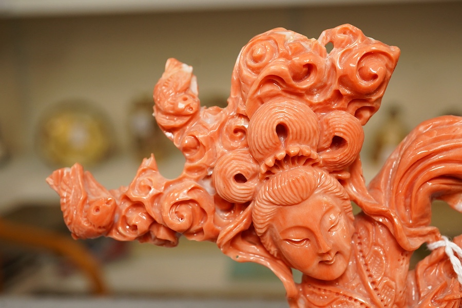 A large Chinese coral carving of a flower fairy, mid 20th century